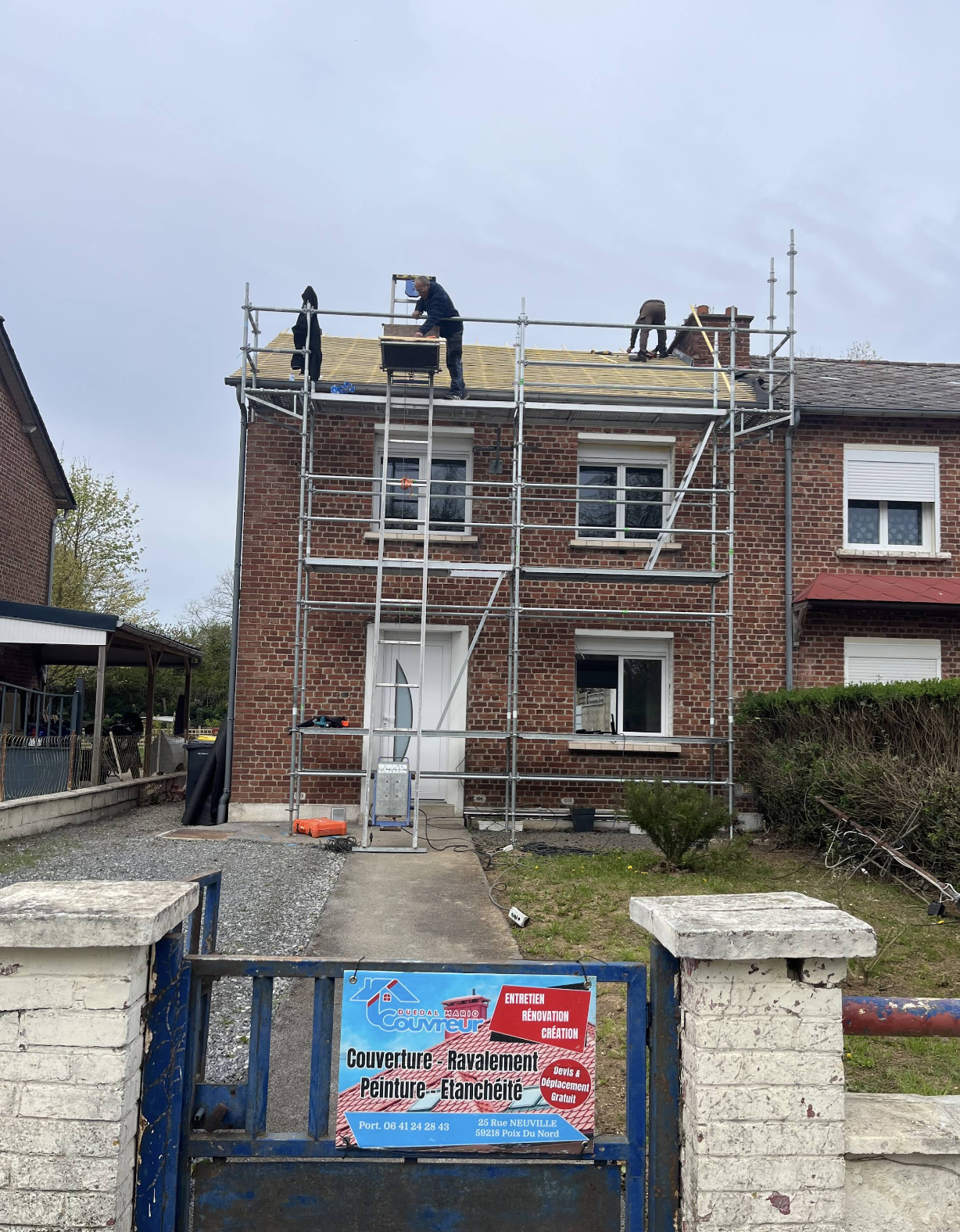 Équipe Duedal Mario sur chantier de rénovation de toiture